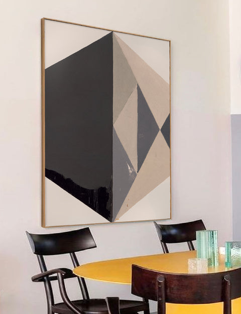 a large abstract canvas art hanging on the living room's wall