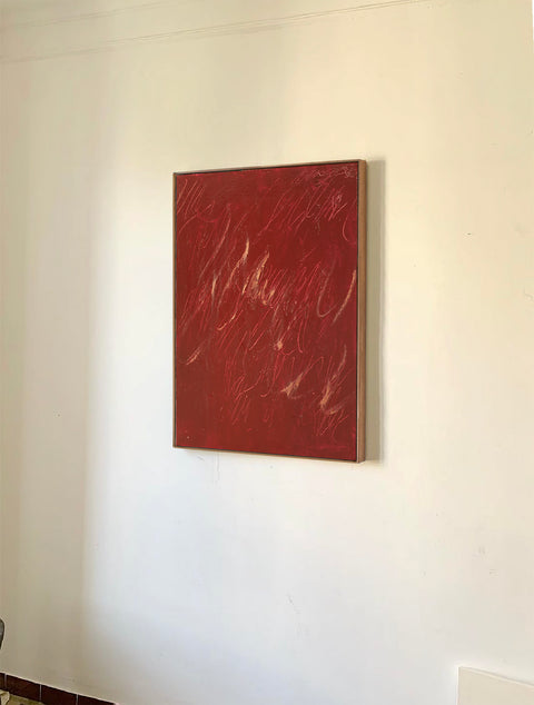 a large abstract canvas art hanging on the living room's wall