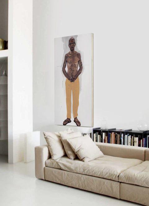 an oversized portrait canvas art hanging on the living room's wall