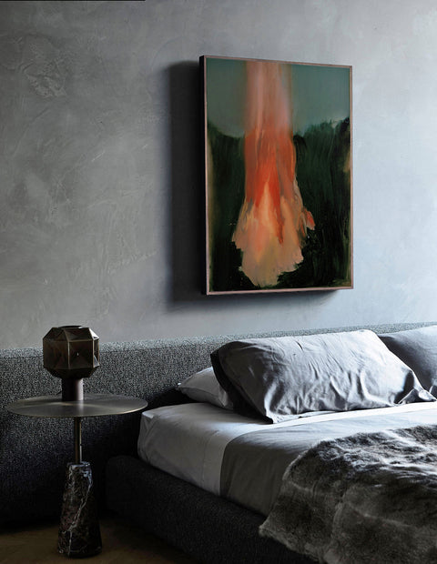 an oversized abstract canvas art hanging on the bed room's wall