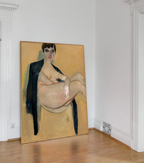 a large portrait canvas art hanging on the living room's wall